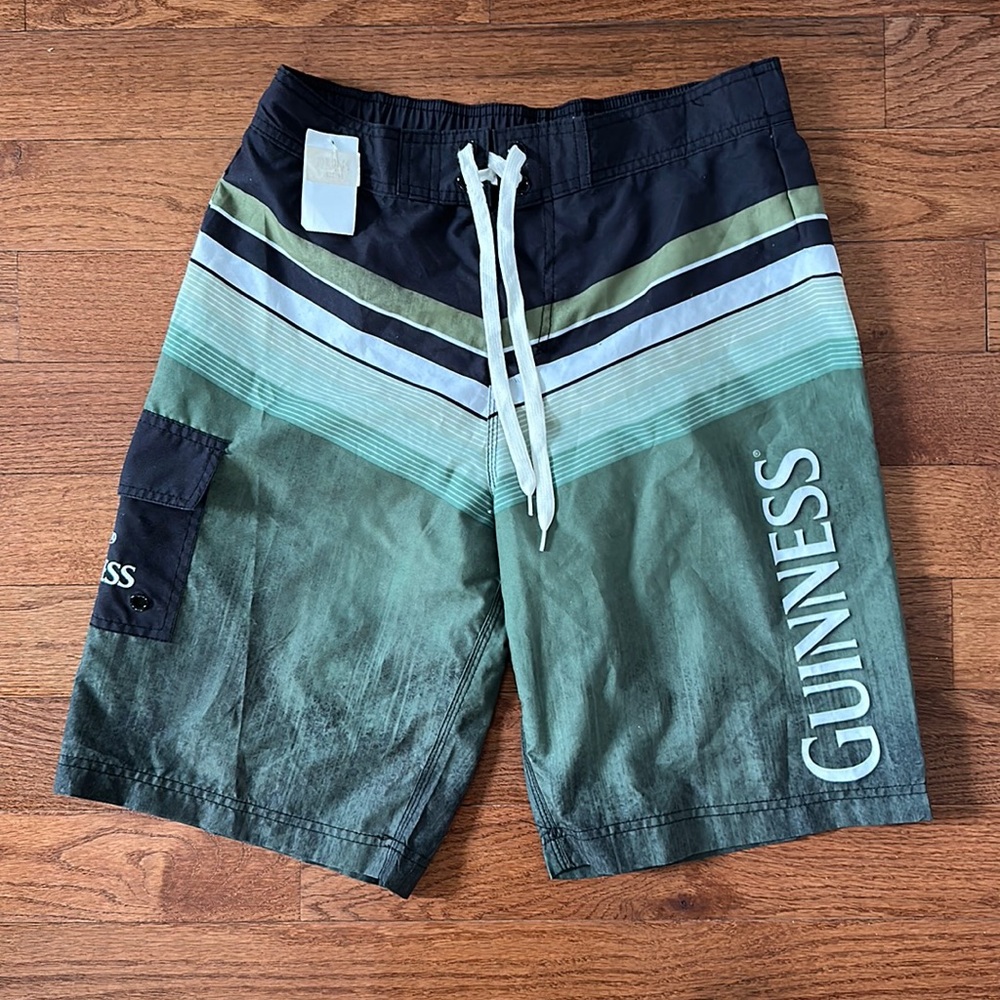 Guinness swim trunks NWT men’s medium with mesh lining and elastic waistband
